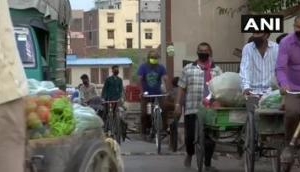 COVID-19: People at Delhi's Gazipur market follow health norms 