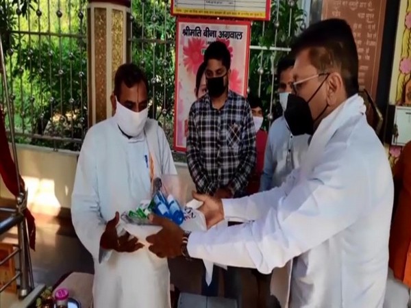 BJP MLA distributes masks, sanitisers, PPE kits to priests in UP's Moradabad