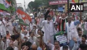 Congress workers in Patna ride bicycles, bullock carts to protest against hike in fuel prices