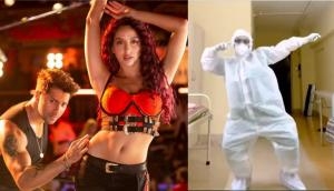 Watch doctor in PPE kit performs dance on Varun Dhawan-Nora Fatehi's Garmi song