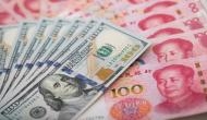 China's Yuan weakens to 7.0043 against US Dollar 