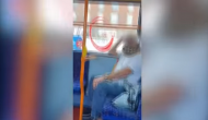 Bizarre! Man wears snake as face mask while travelling in bus; video goes viral