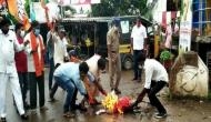 BJP workers burn effigy of Civil Supplies minister after remarks on temple attacks