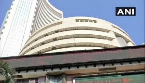 Equity indices close flat after volatile session, metal stocks gain