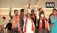 Gujarat by-polls 2020: BJP leaders show victory sign as party leads on all eight assembly seats