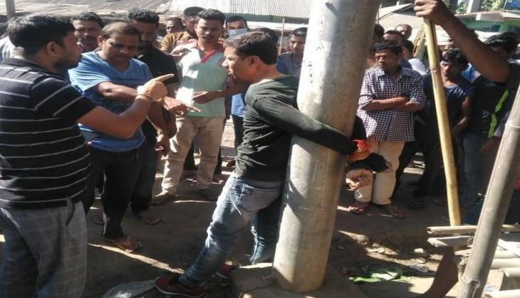 Assam journalist tied to pole, thrashed in public 