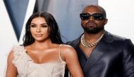 Kim Kardashian, Kanye West are still together but living 'separate lives': Source