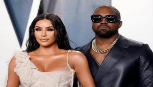 Kim Kardashian, Kanye West are still together but living 'separate lives': Source