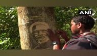 Odisha artist carves PM's portrait on trees urging him to take note of illegal tree cutting