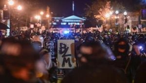 Pro-Trump demonstrators clash with police, counter-protesters in Washington amid protest over election results