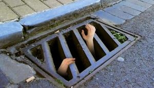 Man cries for ‘help’ after his girlfriend’s brothers dumped him in a sewer
