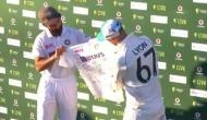 Ajinkya Rahane presents signed Indian jersey to Nathan Lyon for completing 100th Test