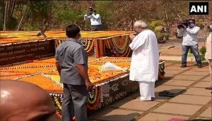Odisha: Naveen Patnaik pays floral tribute to father Biju Patnaik on his birth anniversary