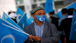 China using pressure tactics on family members to intimidate Uyghur scribes