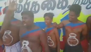 Tamil Nadu Assembly polls: Supporters of VCK candidate Shanavas paint pot symbol on bellies 