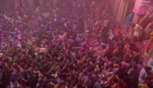 Holi 2021: People offer prayers at Banke Bihari Temple in Vrindavan on Holi 
