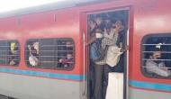 Migrant workers leave Mumbai in packed trains fearing lockdown