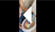 Woman makes party drink in toilet bowl; video will make you say eww!
