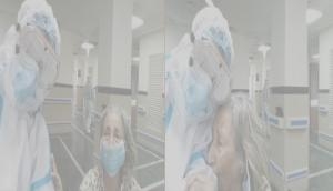 75-year-old woman hugs doctor after recovering from COVID; pic will make you cry!