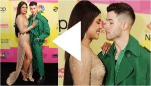 Unseen video of Nick Jonas fixing wife Priyanka Chopra's gown will make you say aww!