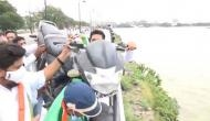 Telangana: Youth Congress throws bike into Hussain Sagar Lake protesting against fuel price hike
