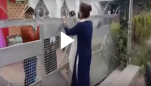 Woman pleads outside wedding venue as lover gets married secretly; video goes viral