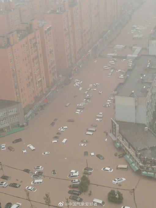 China floods: Rail stations, roads submerged; a dam 'could collapse any time'