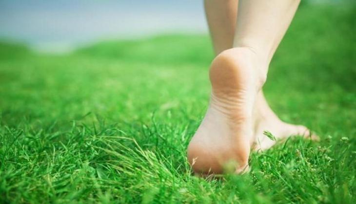 Walking barefoot on grass