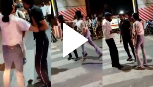 Shocker: Girl beats taxi driver in the presence of police; bystanders call her ‘badtameez’