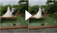 Bride pushes groom and photographer into water during photoshoot; video will make you go ROFL!