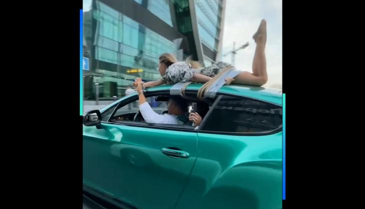 Man ties girlfriend to car's roof for this bizarre reason [WATCH]