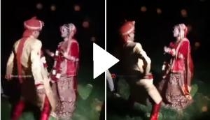 This bride and groom dancing like no one's watching; video goes viral