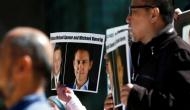 China sentences Canadian businessman to 11 years in prison for spying