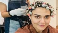 Preity Zinta restarts love affair with curls