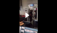 Shocking footage shows woman throwing scissors at complaining customer; video goes viral