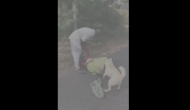 Man brutally attacks mother while dog comes to rescue her; video goes viral