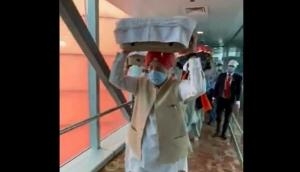 Hardeep Singh Puri receives 3 Swaroop of Sri Guru Granth Sahib brought from Kabul at Delhi airport 