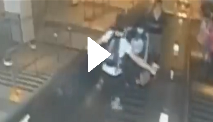 Man kicks woman down escalator; shocking footage goes viral