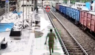 Shocker: Mentally disturbed woman stands between railway tracks; see what happens next