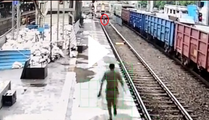 Shocker: Mentally disturbed woman stands between railway tracks; see what happens next