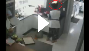 OMG! Woman’s hair catches fire while working in kitchen; video will give you chills