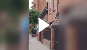Men find hilarious way to get sofa out of house’s upper storey window; video will leave you in stitches