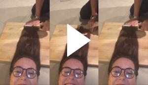 Girl gets hair cut with a meat knife; hilarious video goes viral