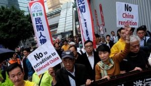 Hong Kong activists hold anti-China protest in Taiwan, urge people to prevent influx of Chinese money 