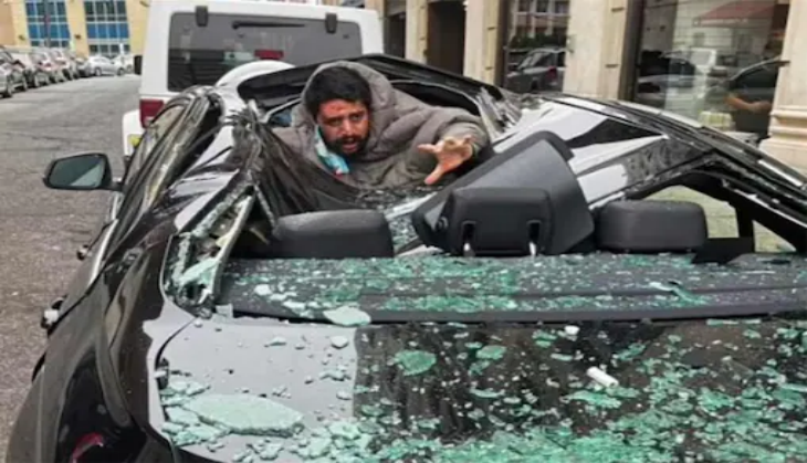 Man lands on BMW