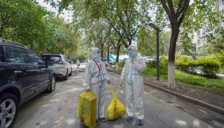 China implements lockdown in Xinjiang's Ghulja city amid COVID surge
