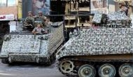 Sectarian militias clash in Beirut raising fears of repetition of 15-year civil war