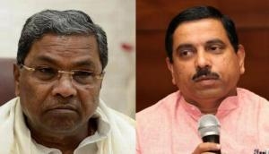 Pralhad Joshi asks Siddaramaiah says, 'Are you not proud of India for 100 crore vaccine achievement?' 