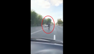 Man performs dangerous bike stunt on a busy road; horrifying video will teach you lesson!
