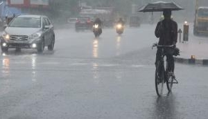 Delhi: Mercury dips in city as rain, strong wind return